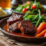 découvrez quel accompagnement choisir pour sublimer vos joues de porc à la bière et régaler vos papilles avec des saveurs parfaitement équilibrées.